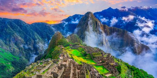 Machu Picchu, Cusco,Peru: Overview of the lost inca city Machu Picchu, agriculture terraces and Wayna Picchu, peak in the background,before sunrise