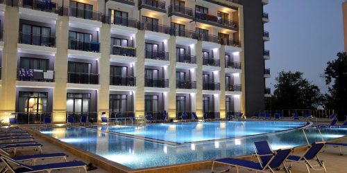 arena mar travel agency pool at night